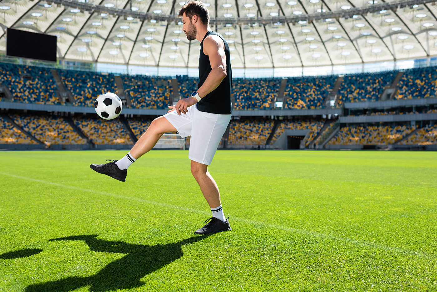 Bouncing soccer ball or football on leg