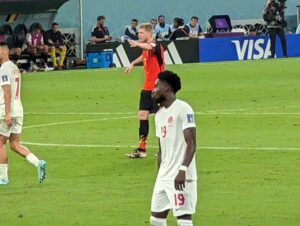 Alphonso Davies of Canada and Kevin De Bruyne of Belgium compete at the FIFA World Cup in Qatar